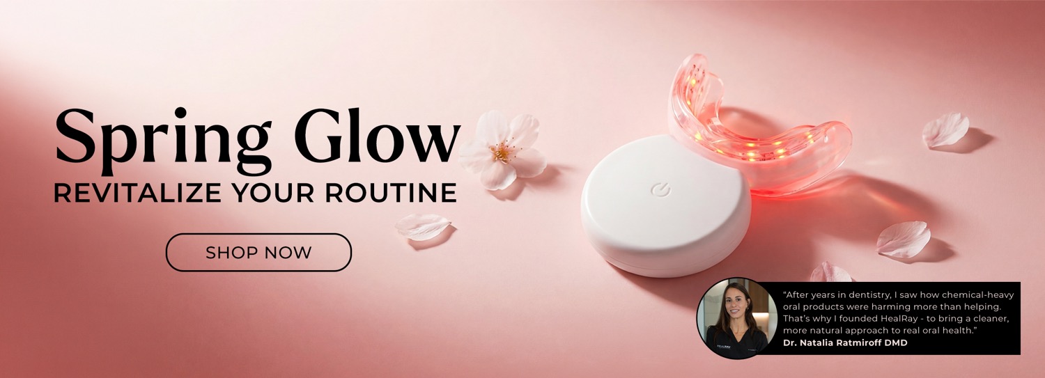 Healray red light gum therapy device on a soft pink background